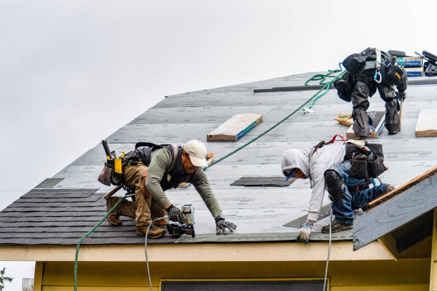 Professional Gutter Installation technician working in Saint James City, FL